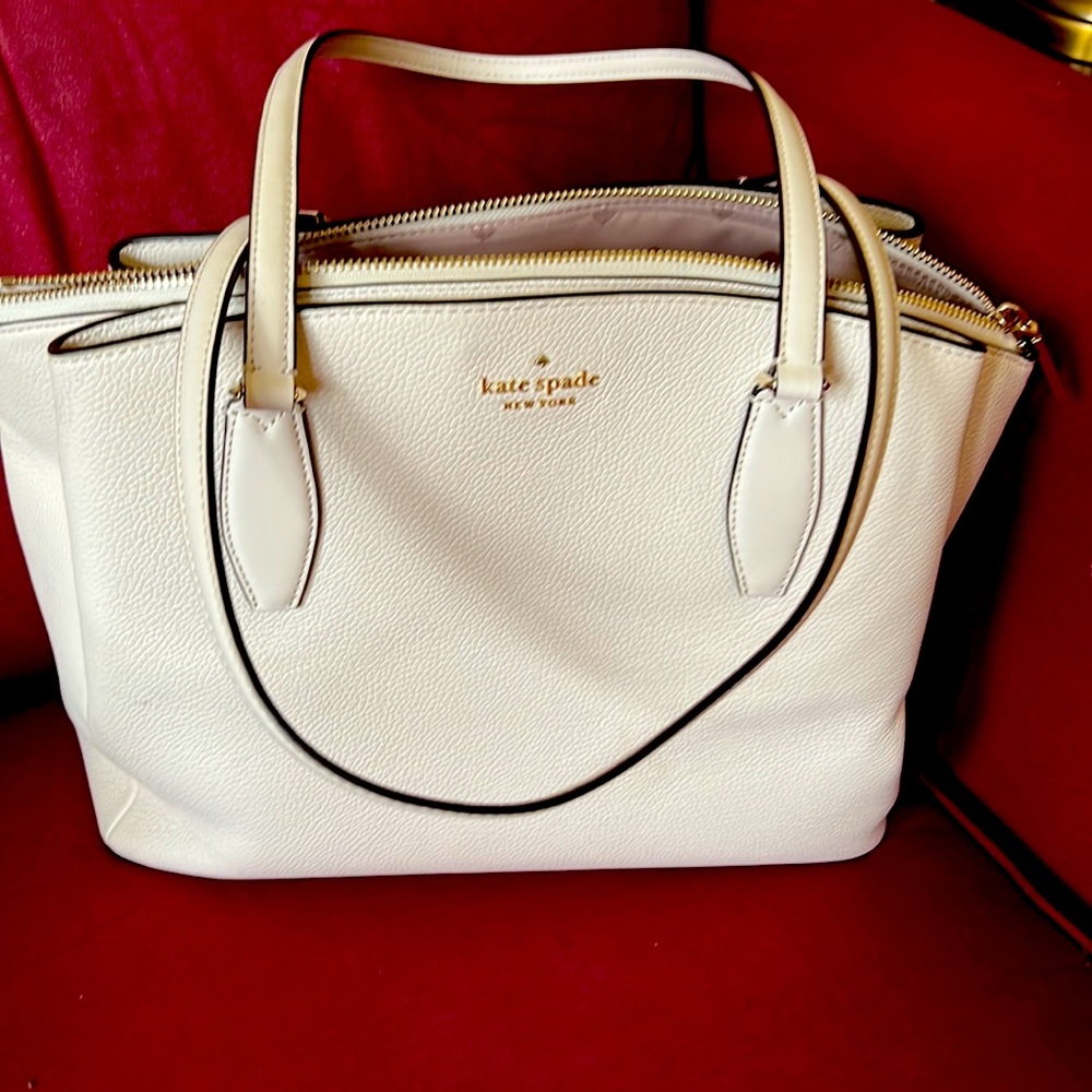 Gorgeous cream-colored purse.